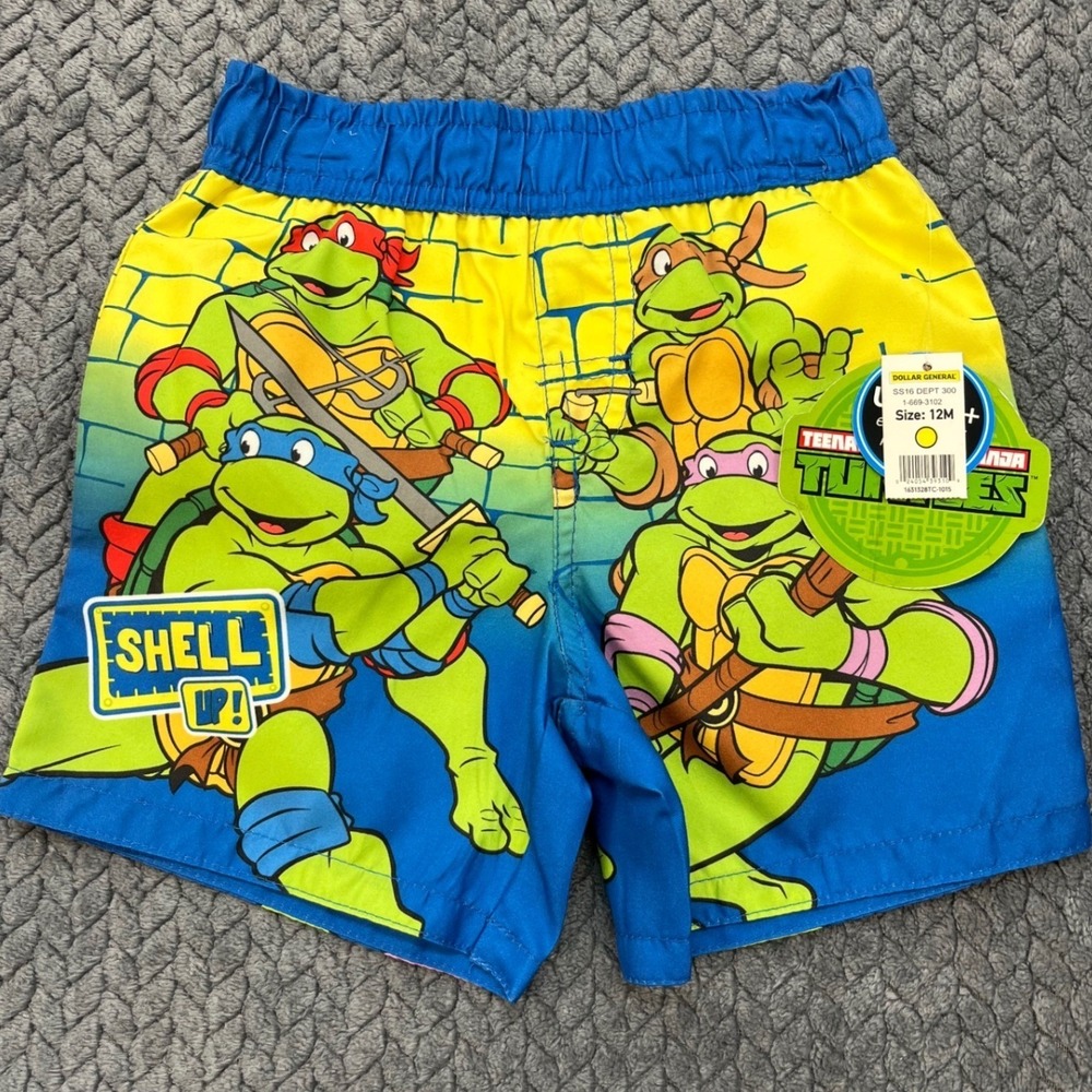TMNT Shell Up Boys Blue Yellow Nickelodeon Swim Trunks Graphic Mesh Lined 12M